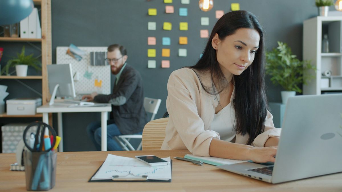 A borrower looking at a payday loan agreement with concern