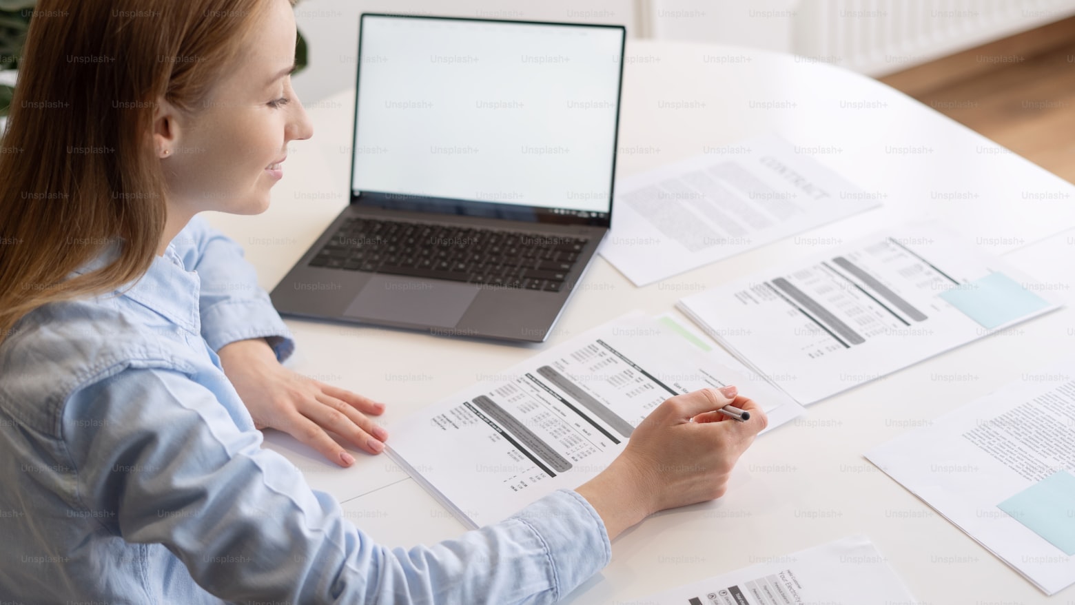 A borrower looking at a payday loan agreement with concern